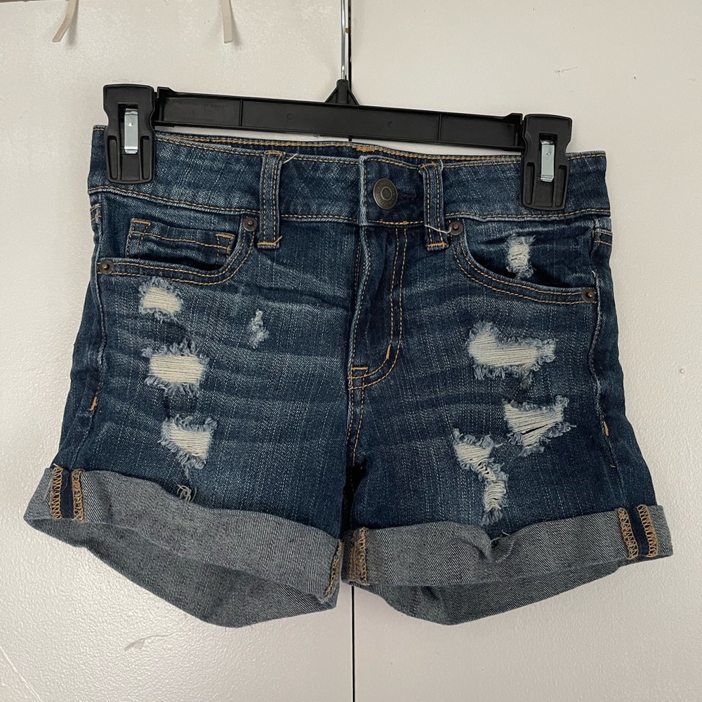 Aero Low Rise Midi Ripped Denim Shorts